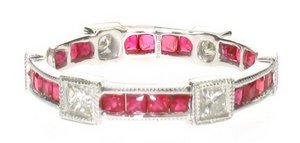 Ruby eternity ring set with square diamonds