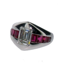Emerald cut Diamond flanked by square Rubies in chunky ring