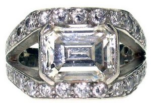 Emerald cut Diamond set into double brilliant cut shank